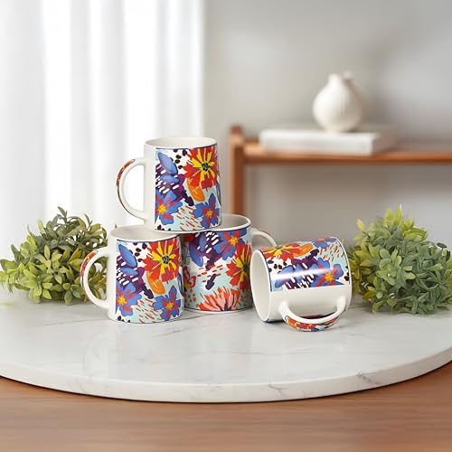 Image of Miah KaleidoBloom Ceramic Cup Set - Set of 4 | 10.16 cm x 6.85 cm x 8.89 cm | Handcrafted Coffee & Tea Mugs | Microwave & Dishwasher Safe | Vibrant Abstract Floral Design