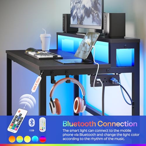 Image of YATINEY Small Computer Desk with Charging Station and LED Lights, Gaming Desk with Monitor Stand, 2-Tier Home Office Desk with 4 Side Hooks, for Living Room, Home Office, Black DN01UDBBY2