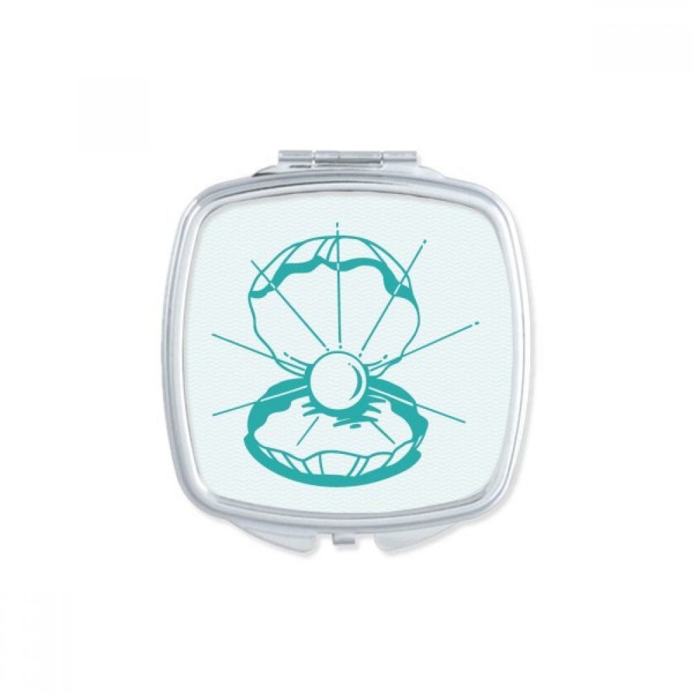 Miroir compact pétoncle pour vos retouches beauté en voyage