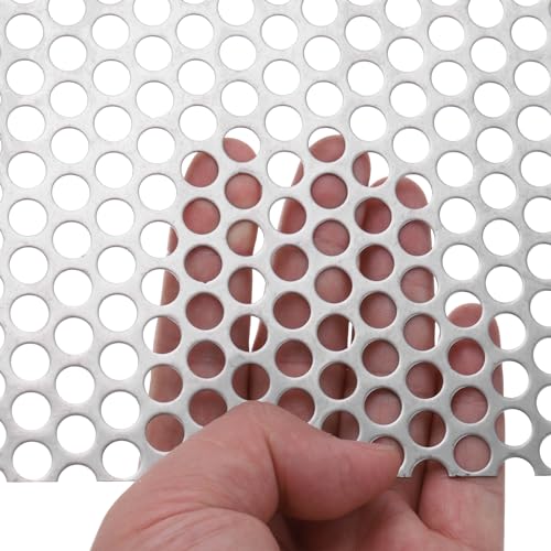 Paravent décoratif et grille de ventilation design en tôle perforée inox pour aménagement intérieur