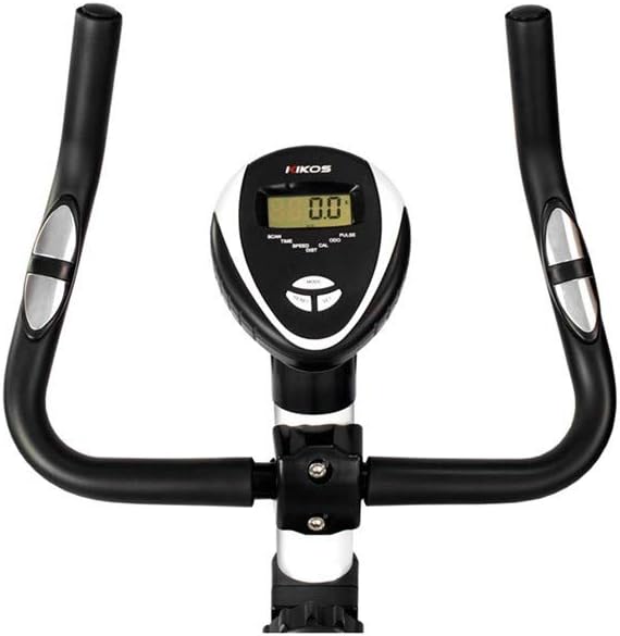 Imagem superior da bicicleta ergométrica em fundo branco liso.