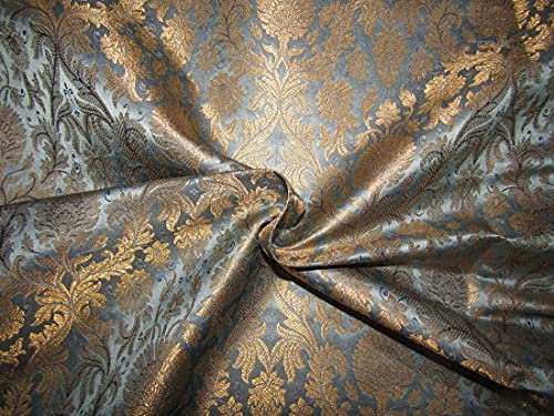 Tissu brocart de soie gris nuageux et fils d'or pour donner vie à vos projets de couture