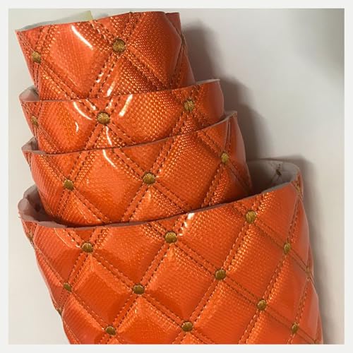 Tissu cuir simili matelassé orange pour canapé voiture et meuble au mètre PU