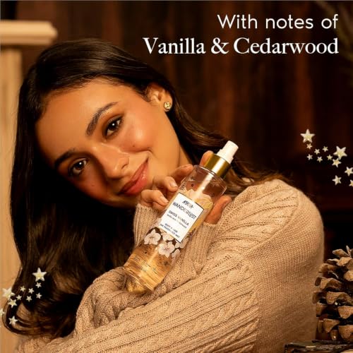 Image of Nykaa Wanderlust Rakhi Gift Set for Women - Swiss Vanilla Body Care Kit (700ml) | Warm Vanilla & Cedarwood Fragrance Notes | Shower Gel, Lotion, Body Mist with Free Pouch | Premium Rakhi, Festive & Birthday Gifting Combo | Pack of 3