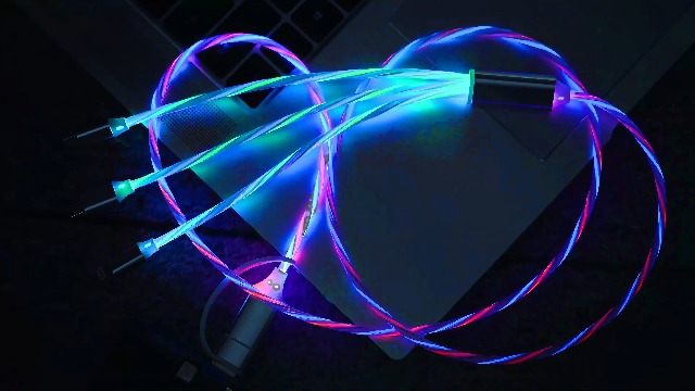Image of 6-in-1 LED Colorful Flow Charging Cable, 47-inch USB Cable, Supports Simultaneous Charging & Data Transfer, Flexible Tangle-Free PVC, Multi-Device Compatible, Charges 3 Devices at Once.