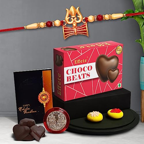 Image of DeoDap Multicolor Trishul Roli Chawal Rakhi Rakhi with Chocolate Beats 32gm, Silver Pooja Coin, Tilak Set, Greeting Card - Rakhi Gift for Brother