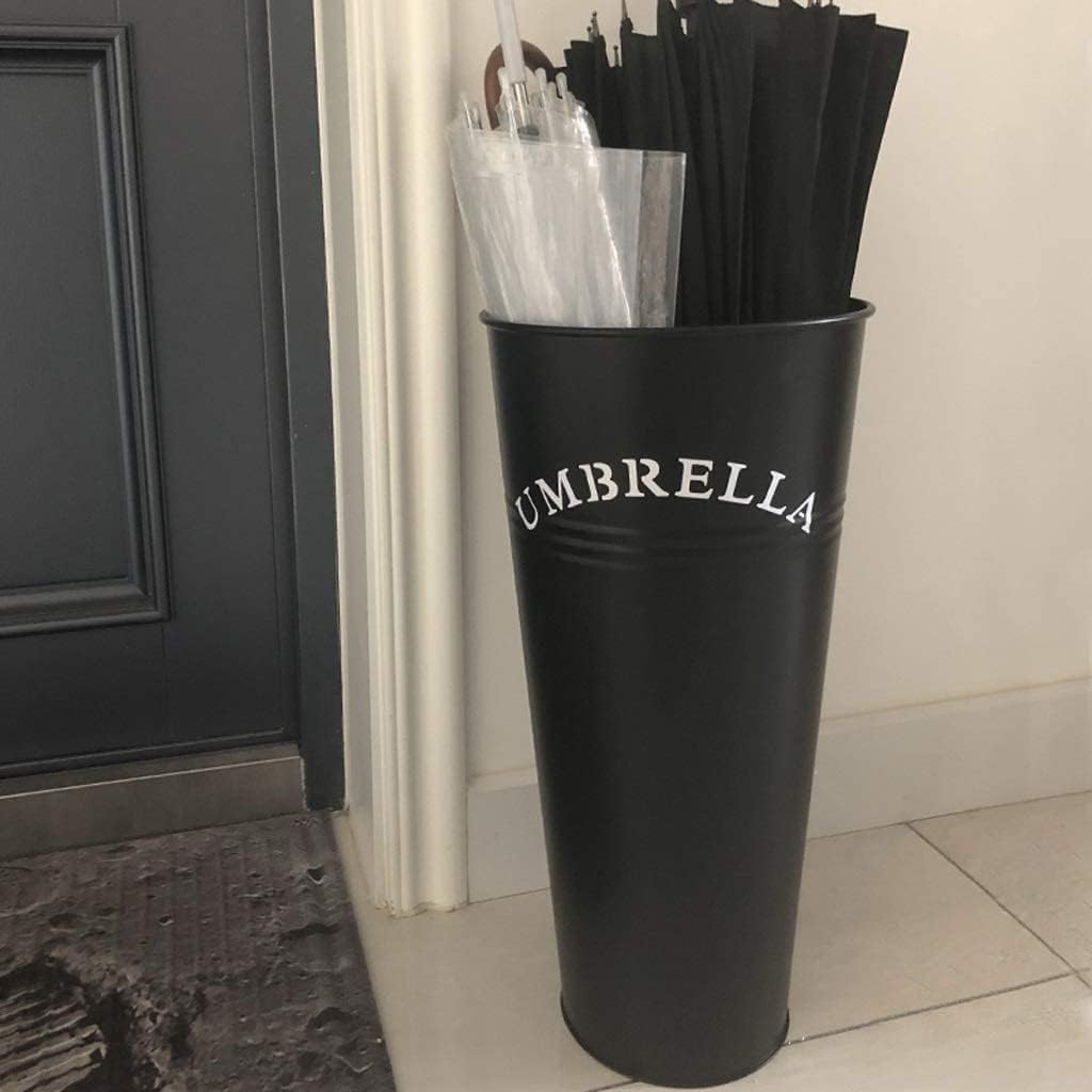 Porte-parapluie en fer forgé idéal pour garder une entrée de maison propre