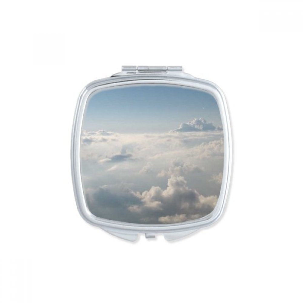 Miroir de poche orange soleil et ciel bleu pour maquillage portable