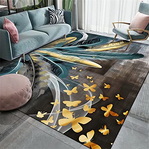 Tapis abstrait moderne au design graphique plume et touches d'or