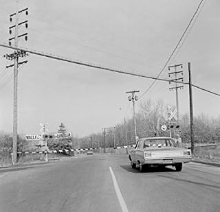 Railroad crossing gate in stop position Poster Print (24 x 36)