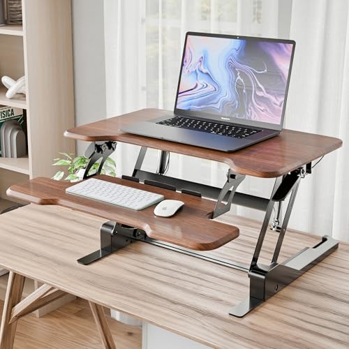 Image of Mount-It! Height Adjustable Standing Desk Converter, Compact 30 inch Wide Tabletop Standing Desk Riser with Gas Spring, Desktop Stand Up Workstation with Keyboard Tray Fits Monitor or Laptop, Dark Walnut