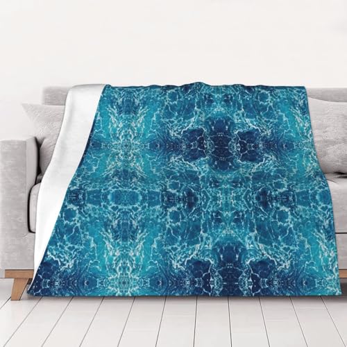 Couverture océan tropical lavable pour cocooning sur canapé