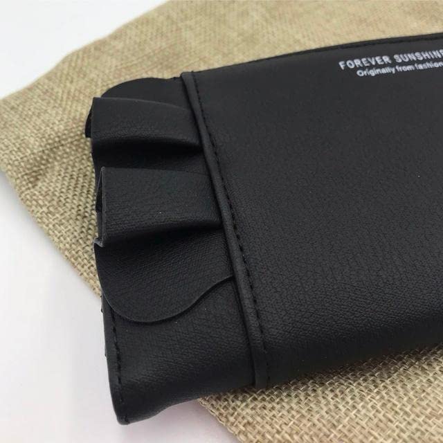 perche フリルデザイン 黒 二つ折り財布 タッセル付き ロングセラー＞ペルケ perche アクリル玉がま口2つ折り財布