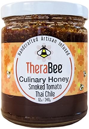 TheraBee Smoked Tomato-Thai Chile Culinary Honey. Made with 100% pure, raw, unheated, unfiltered, USA honey. Handcrafted and infused with organic dried tomatoes dehydrated and smoked over cherry wood and organic thai chiles. Spicy and tasty as a BBQ Glaze, drizzled over cheese, in salad dressings or straight out of the jar. 100% Natural. Gluten Free. Beautiful and unique gift idea for the foodie on your list.