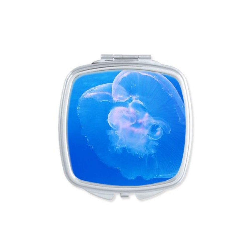 Miroir de poche méduse bleue accessoire retouche maquillage en voyage