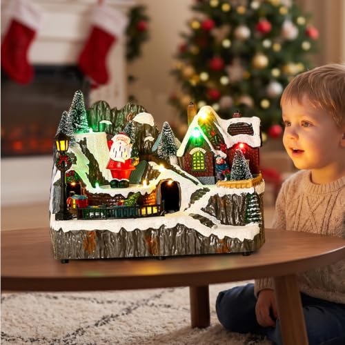 Pueblo navideño con luz sin cables para solucionar la falta de espacio en la mesa 6