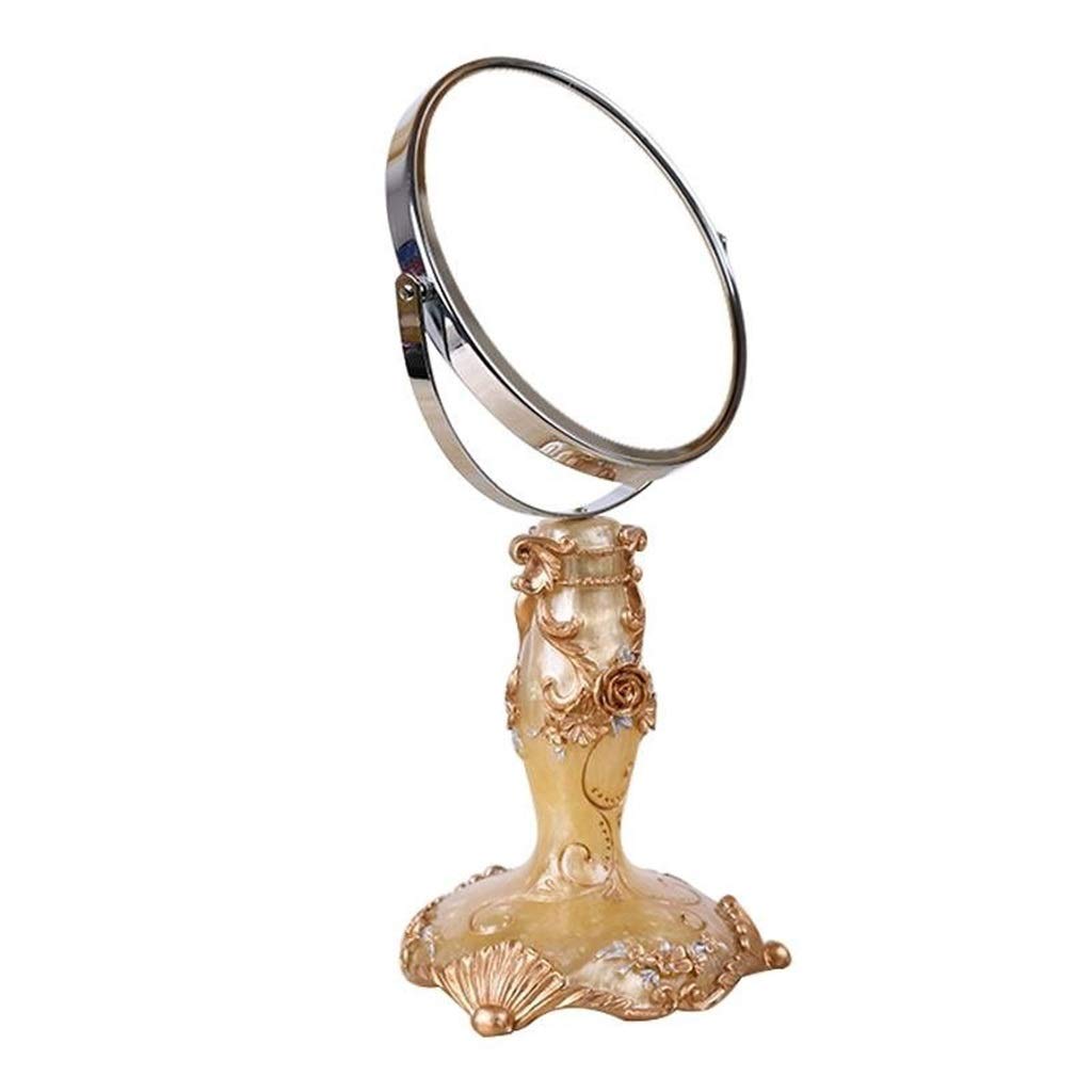 Miroir de maquillage compact pour routine beauté sur petite coiffeuse