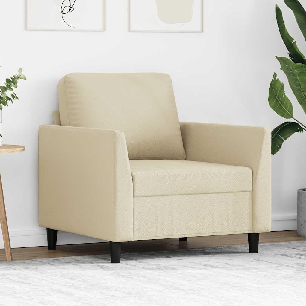 Fotel kremowy ze sztucznej skóry, szerokość siedziska 60 cm, z metalowym stelażem, tapicerowany i wytrzymały, idealny do salonu, pokoju gościnnego, zajmuje mało miejsca i wygodny do relaksu i