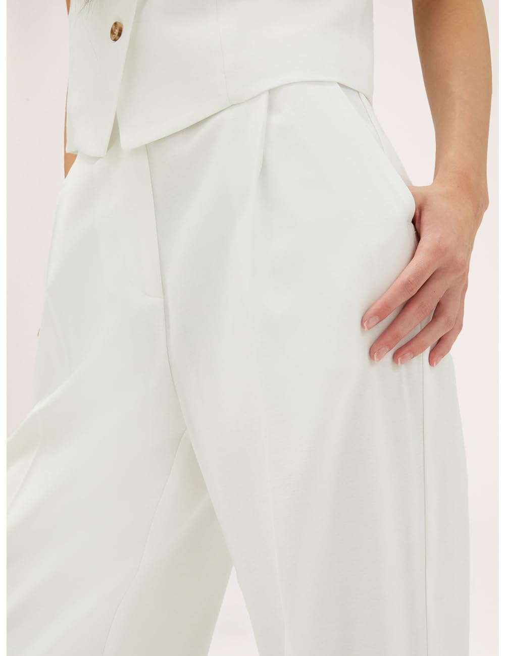 Motivi: Pantaloni Palazzo con Pinces Stagione Primavera Estate 2024.