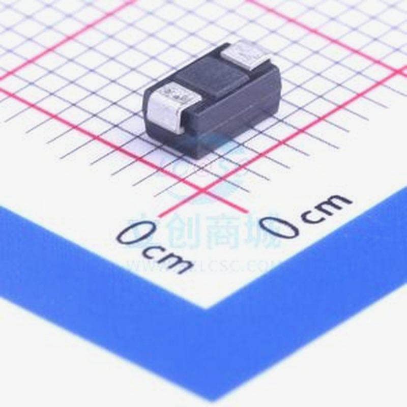 Top view of the MachineMid SMAZ15-13-F Zener diode on a grid for scale.
