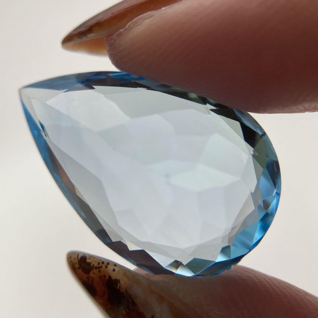 Amazon.co.jp: (230)ソ付 大粒 スカイブルートパーズ ルース 26.467ct 