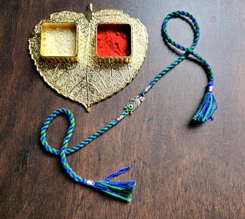 Image of ROOVI Pure 925 Sterling Silver Rakhi for Bhai with Roli Chawal | Chandi Ki Rakhi Original | Krishna Morpankh, Trishul, Ganesh, Ram, Om, Evil Eye, Infinity Rakhi for Brother With Certificate