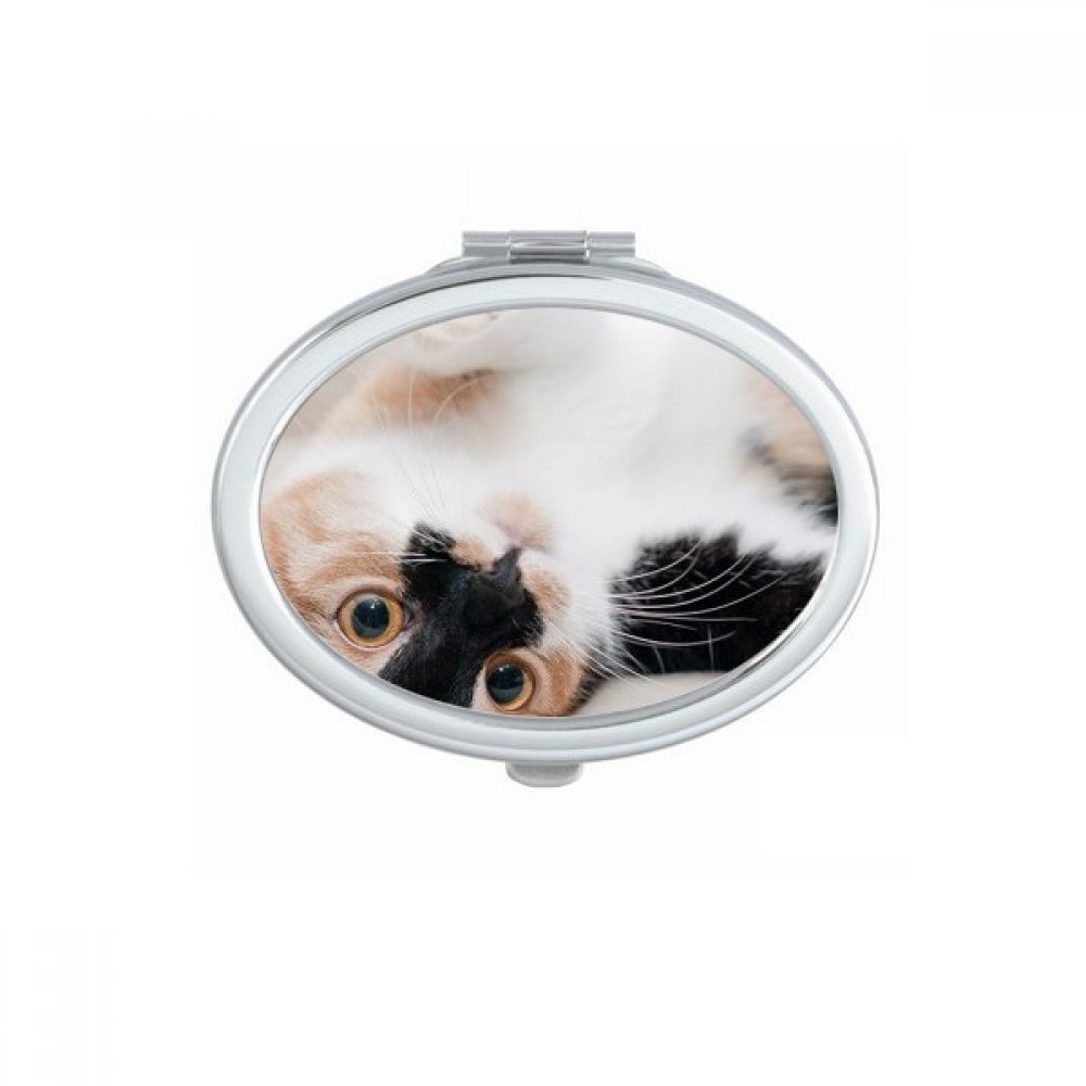 Miroir de maquillage petit format ovale pour retouche visage rapide