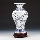 FEATURES: Die blaue und weiße Porzellan-Vase Modellierung klassisch, mit chinesischen Drachen Mustern und binauralen Drachen, glatt und zart texture.Ceramic Vasen sind oft verziert, und sie sind oft zu halten, schneiden verwendet flowers.It auch Sammlerwert hat.