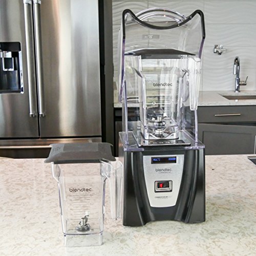 Commercial blender jar and motor base in use