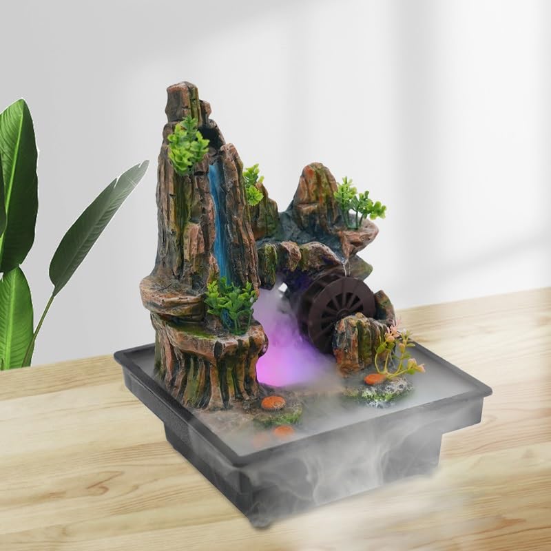 Fontaine de rocaille d'intérieur feng shui avec cascade d'eau