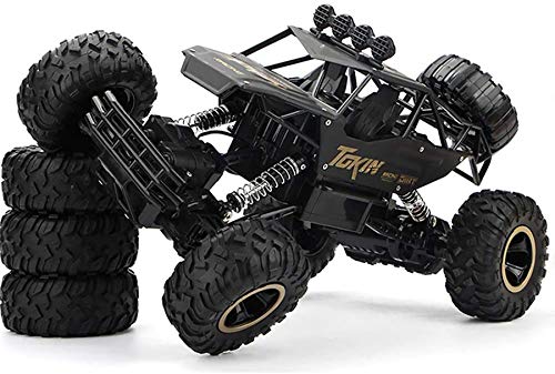 Image of Magicwand 1:16 Scale R /C Rechargeable 4 Wheel Drive Rock Monster with 4 Extra Wheels for All-Terrain Types【Black or Gold】【Pack of 1】