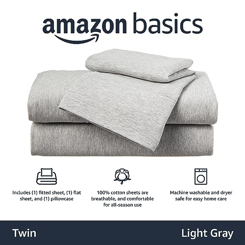Image of Amazon Basics Breathable, Stretchy 100% Cotton Jersey Knit 3 Piece Bed Sheet Set with Deep Pockets, Flat and Fitted Sheets, Pillowcase, Machine Washable, Twin, Light Gray, Solid
