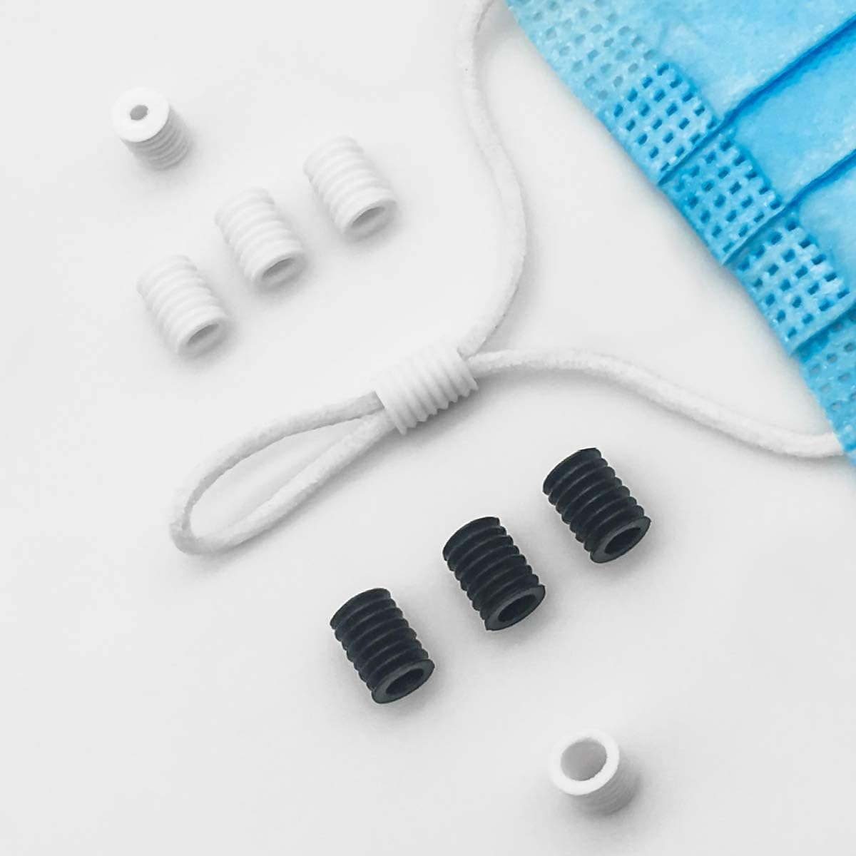 100 Pcs Adjustment Earloop Locks, Elastic Cord Buckles Toggles for Drawstrings Anti-Slip Strings Adjuster, with Storage Box for Kids Ear Rope Stopper (White)