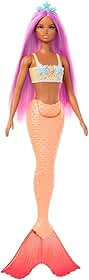 Boneca Barbie Sereia Cabelo Roxo Mattel. Look lilás com cauda brilhante e tiara de concha para brincar no fundo do mar. Para crianças a partir dos 3 anos.