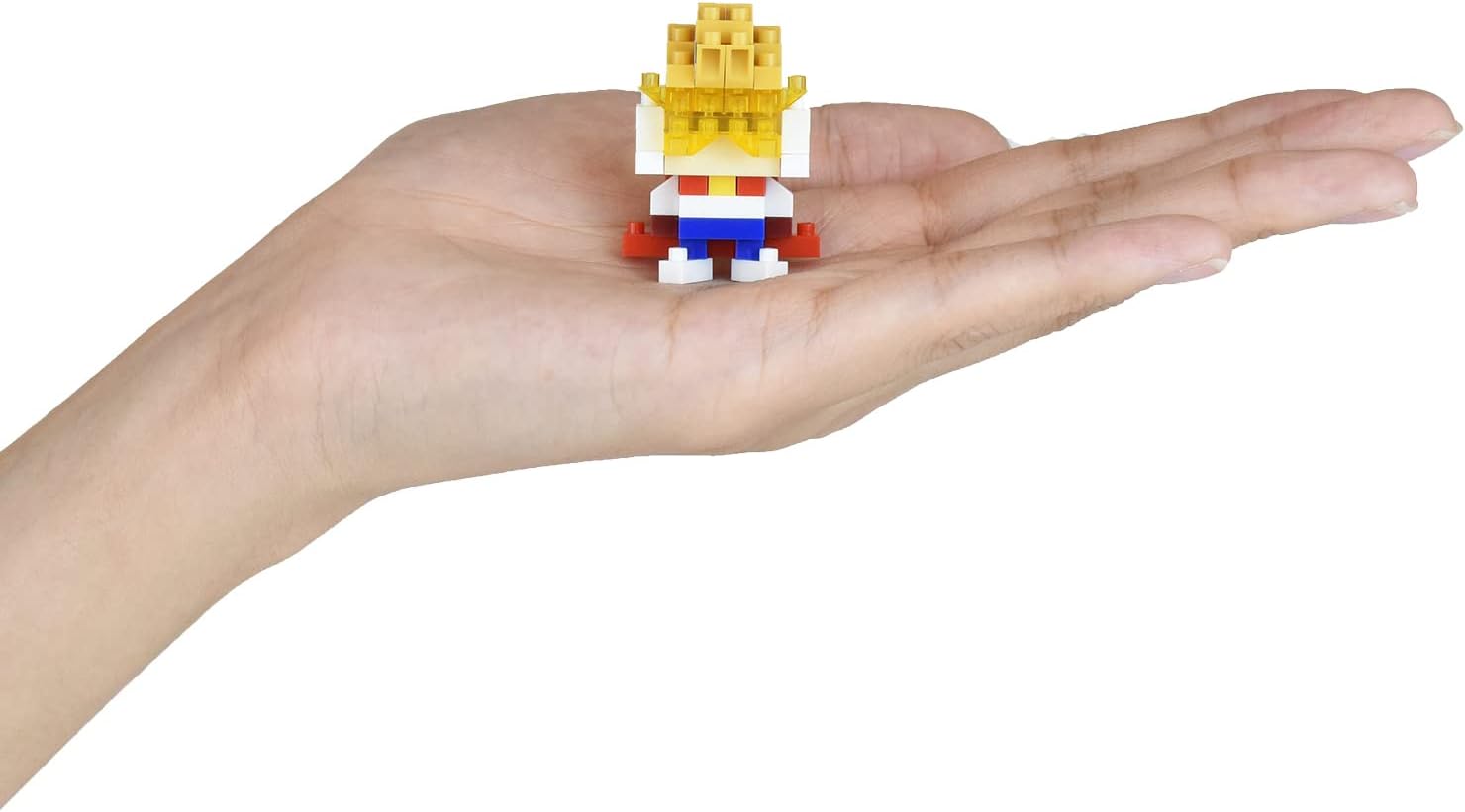 Assembled Mirio Togata nanoblock figure held in the palm of a hand, demonstrating its small size.