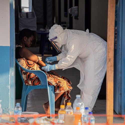 Balancing the risks of catching Ebola while covering the outbreak