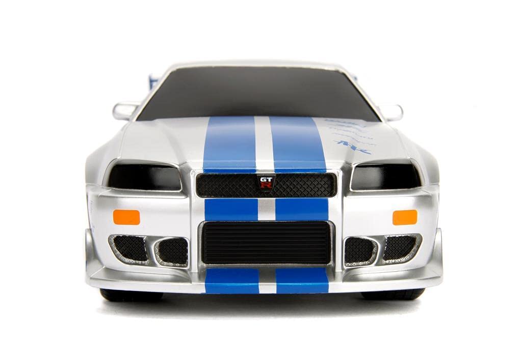 Jada Toys Fast & Furious RC samochód wyścigowy, Nissan Skyline GT-R, R34, samochód zdalnie sterowany, funkcja turbo, dwukanałowy, pilot radiowy, funkcja ładowania USB, baterie w zestawie, 1:16, 29 cm