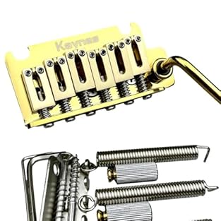 Brass block, CNC machined. Push on fit tremolo arm.Fits guitar with 2-Point style tremolo bridge String Spacing is 10.5mm; Distance Between two Posts: about 56mm (from center to center).Pop-in tremolo arm with adjustable tension Assembly includes pos...