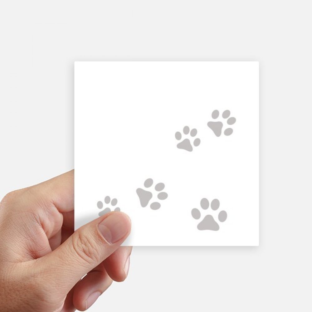 Autocollant patte de chat gris 10cm : la solution pour masquer les rayures de PC