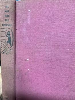 Hardcover The man with the monocle, Book