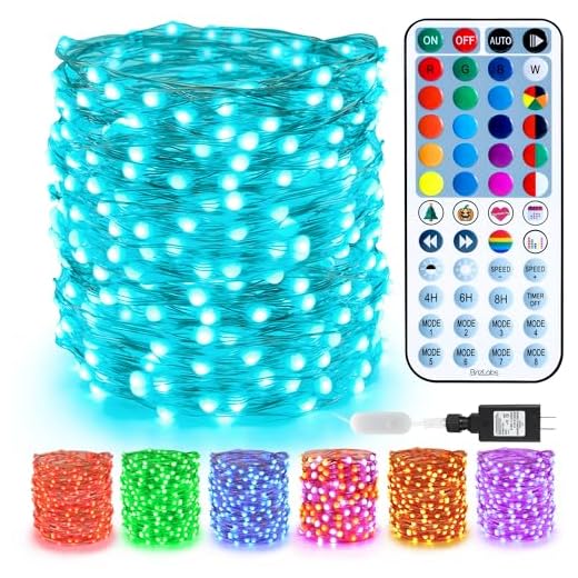 BrizLabs Christmas Fairy Lights - 66ft 200 LED Color Changing Fairy Lights with Remote, Plug-in RGB Rainbow Xmas Twinkle Light Indoor Purple Orange Starry Light for Xmas Halloween Home Party Wedding