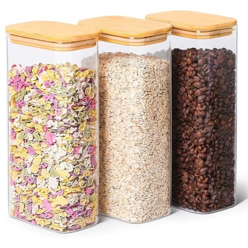 Three ComSaf 2 Qt Rectangle Glass Storage Containers arranged in a narrow cabinet space.