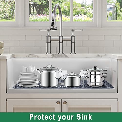 Image of GUUKIN Sink Protectors for Kitchen Sink 19x13 & 24x12.5 & 13x11 & 26x14 & 28x14 & 29x15, Large Silicone Mats Grid for Bottom of Farmhouse Stainless Steel (24x12.5 with 3 Reserved Holes)
