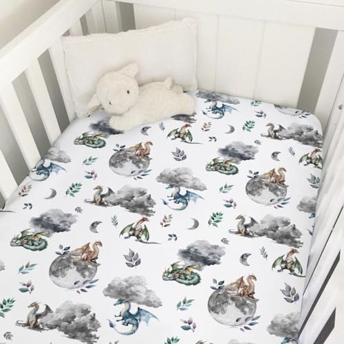 Image of Watercolor Dragons Fairytale Baby Crib Sheets - 52''x28'' Dragon Wings Leaves Moon Clouds Stretchy Fitted Mattress Cover for Boy & Girl - Soft Nursery Bed Sheets for Standard & Toddler Mattress
