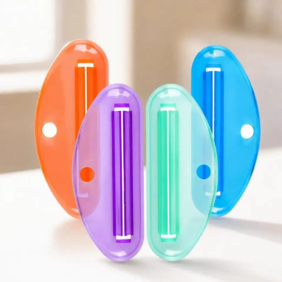4Pcs Toothpaste Squeezer Rolling Tube Dispenser(1)
