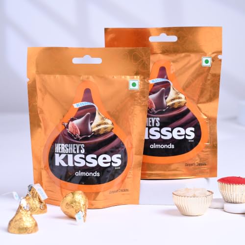 Image of FlowerAura Rakhi For Brother With Chocolate - Set of 2 Pink Floral Rakhi With 4 Chocolates & Roli Chawal Tikka In Box - Festive Hamper Gift For Brother | Bhai | Cousins (Same Day Delivery)