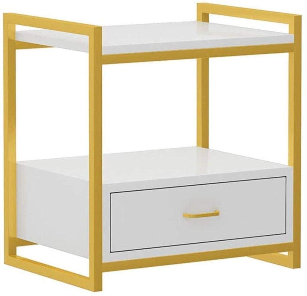 Table de chevet avec tiroirs de rangement pour optimiser l'espace du lit