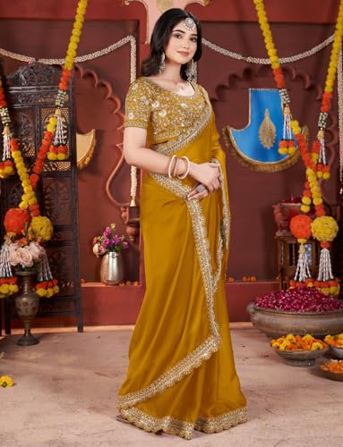 Image of DHARMEE Women's Elegant Designer Sarees Premium Rangoli Fabric with Embellished Border, Lightweight and Stylish Ethnic Wear - Perfect for Parties, Weddings, and Festive Occasions..