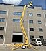 High-Reach Articulating Boom Lift - 12m Towable Aerial Platform for Wind Farm Upkeep, Power Line Repair, and High-Altitude Industrial Maintenance