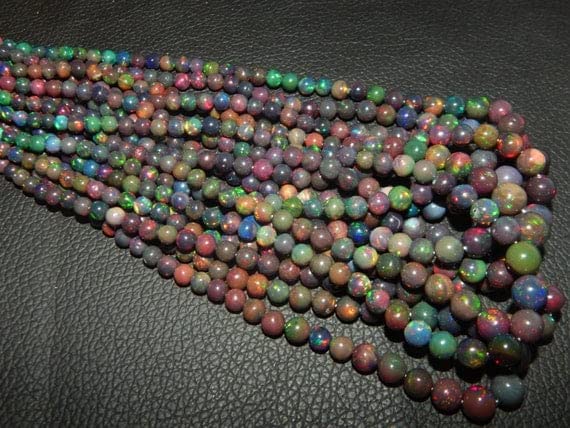 Opale noire Welo AAA d'Éthiopie en perles lisses 4-7.5mm pour création joaillerie de luxe